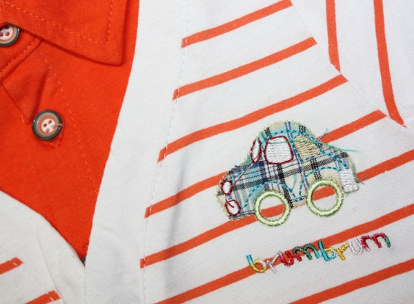 Jungen Polo-Shirt ABC mit Fahrzeugen in orange